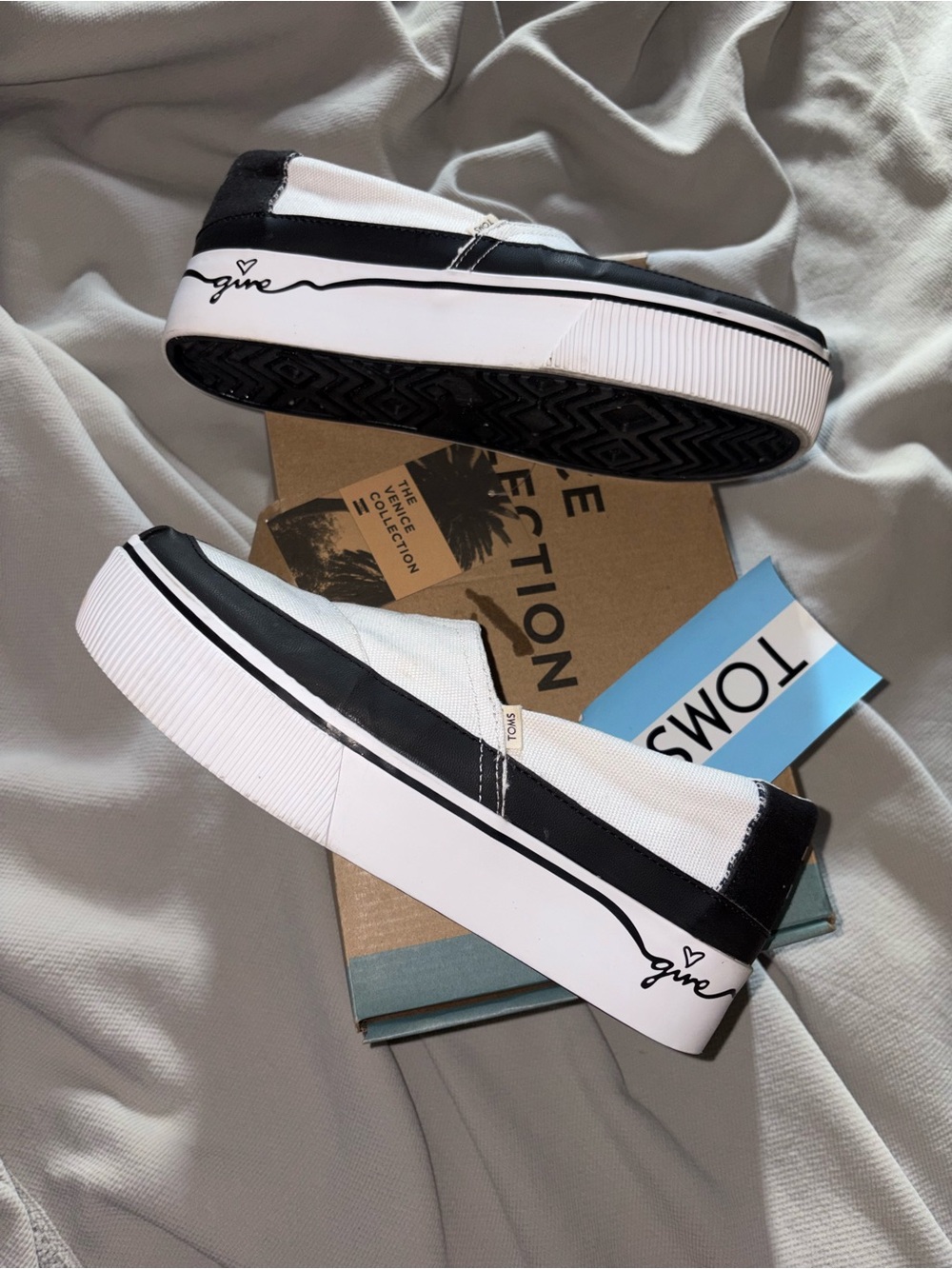 TOMS White Canvas Slip-On Shoes with Black Trim - Picture 3 of 7
